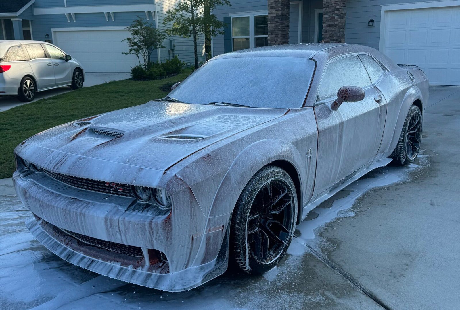 Car foam pre-wash treatment to loosen dirt and contaminants before Exterior detail.