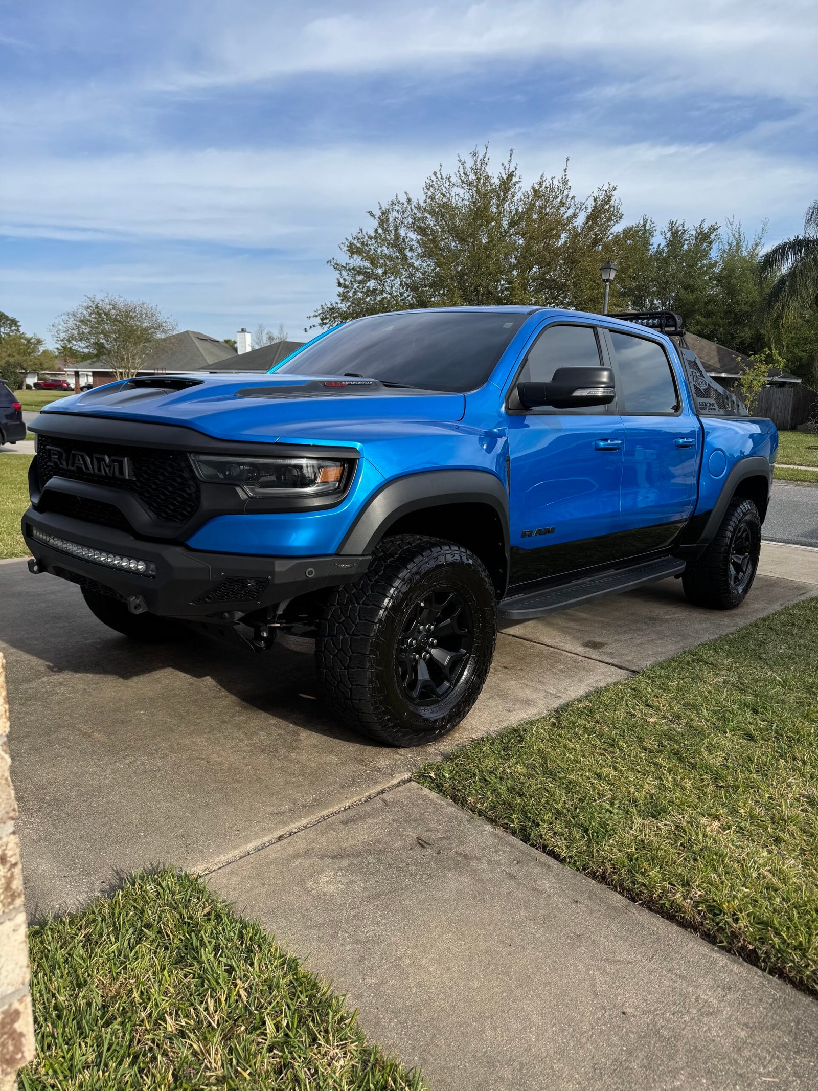 Detailing in Jacksonville, FL on a pick-up truck. Blue paint is sparking after detail.
