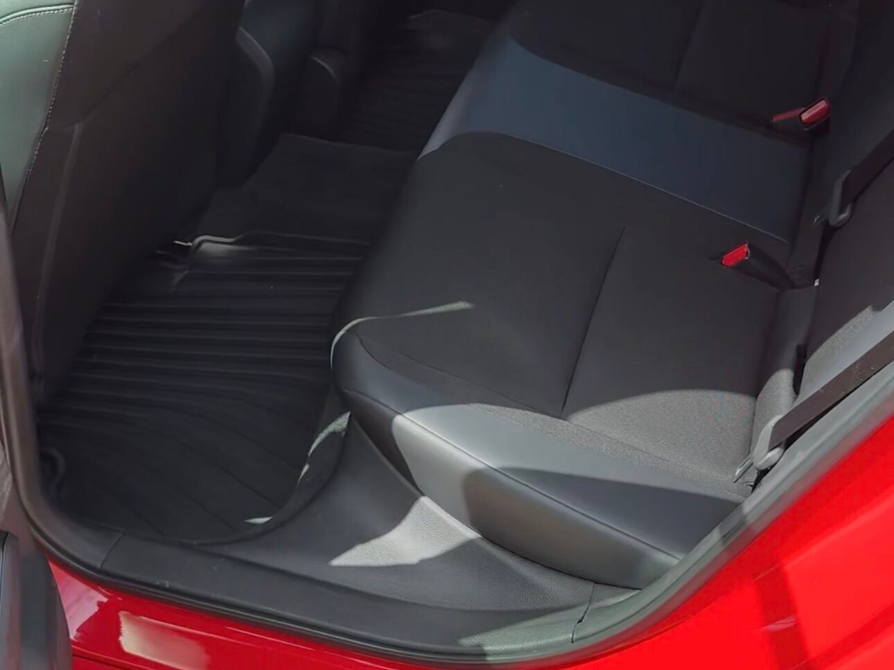After Interior detail of red Honda Civic in Orange Park, FL